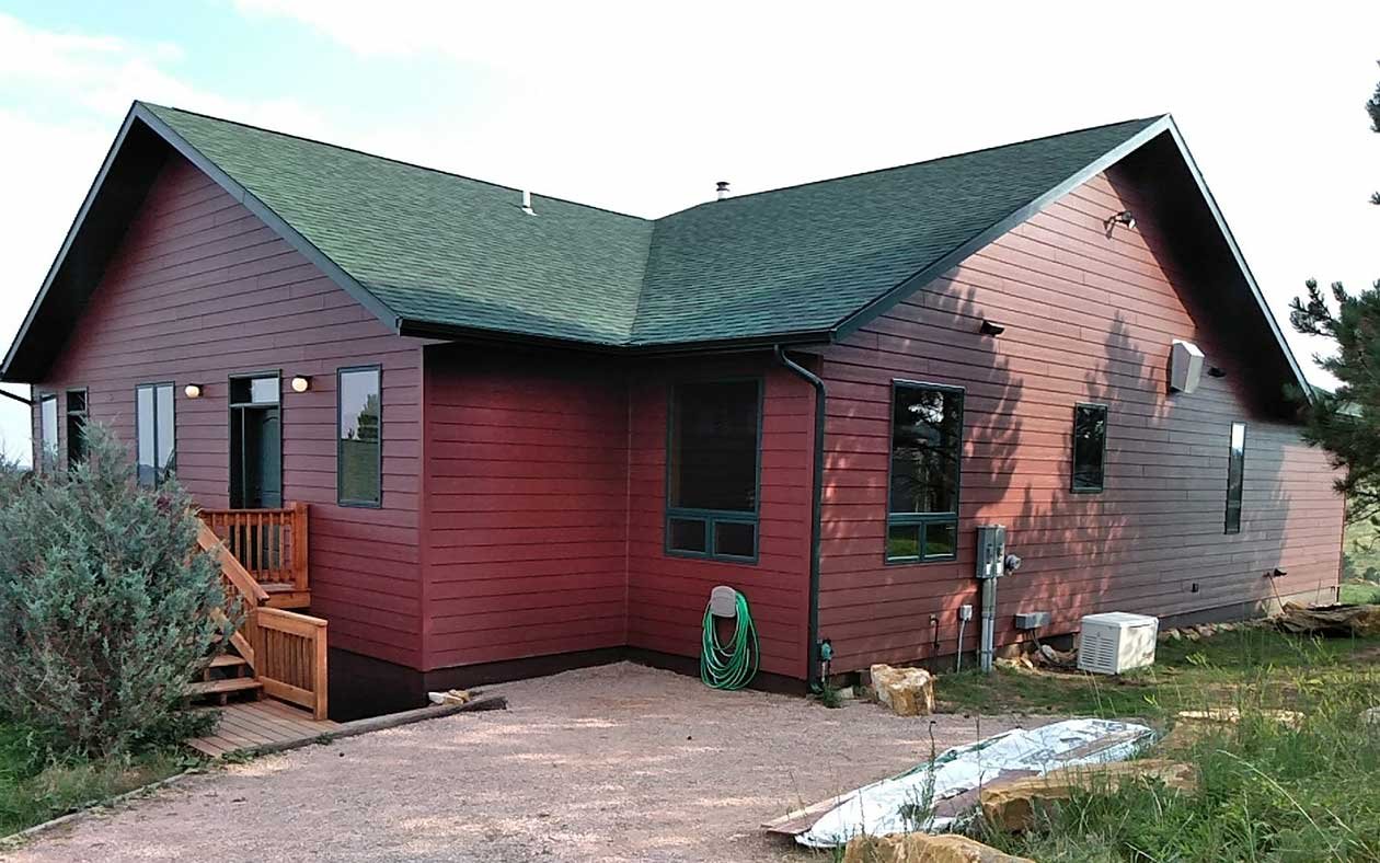 Cabin like home with new roof and siding